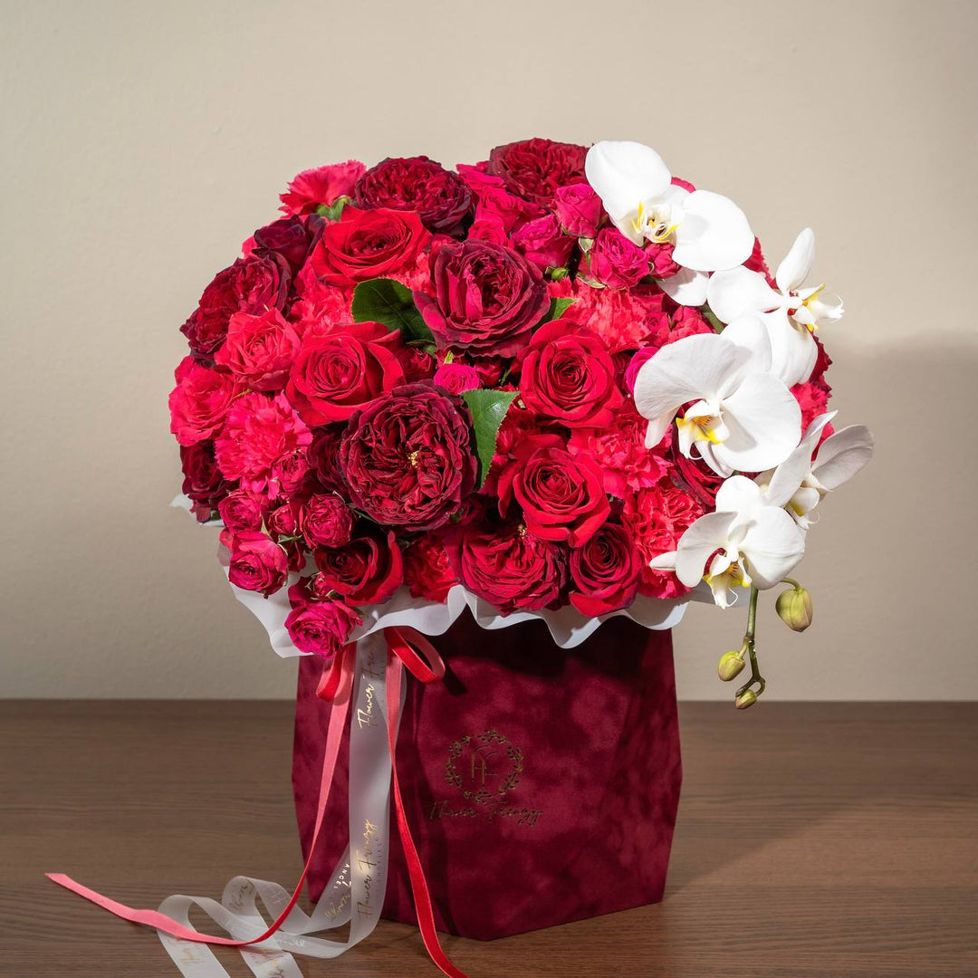 Elegance in Bloom Signature Arrangement