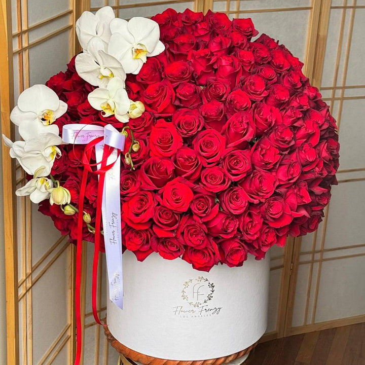 150 Red roses and orchids in a white box. – FlowerFrenzyLA
